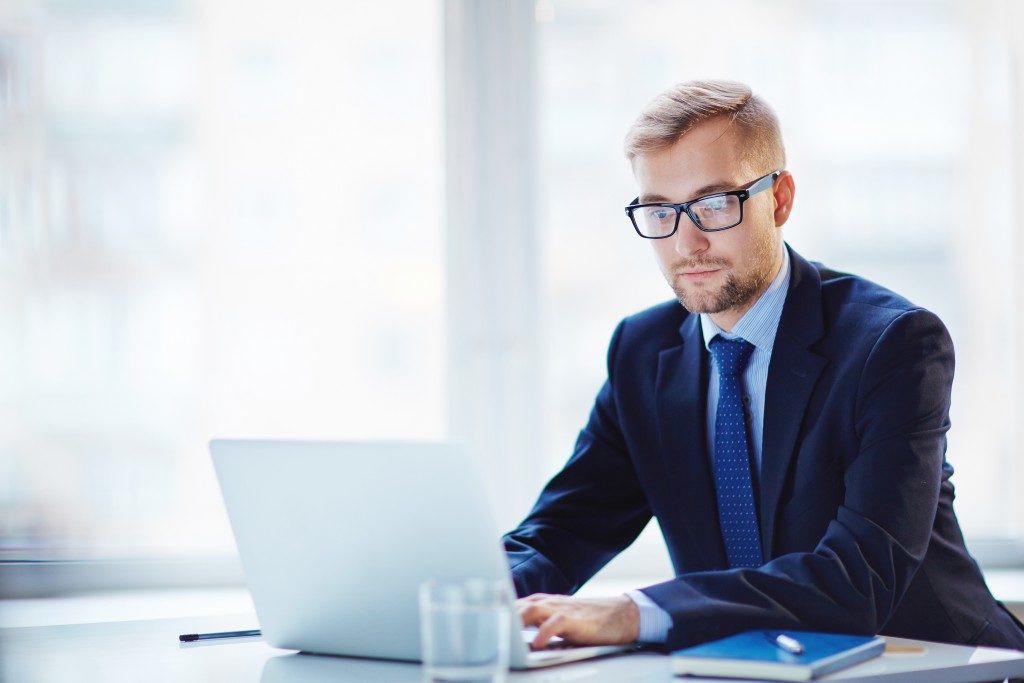 businessman with glassess working