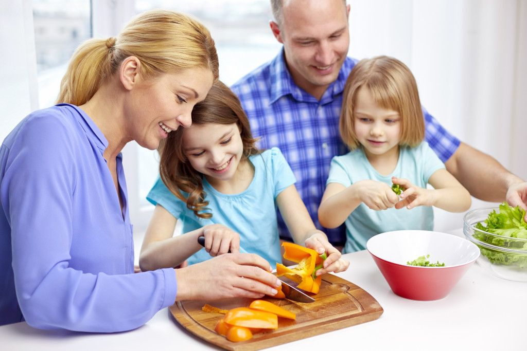parents preparing food with their kids