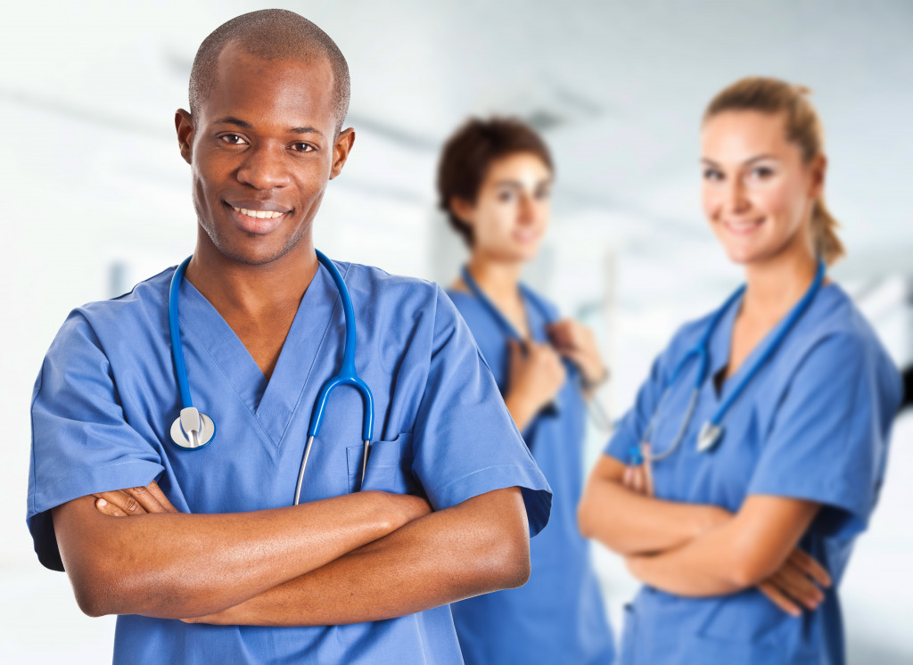 nurses in blue scrub suits